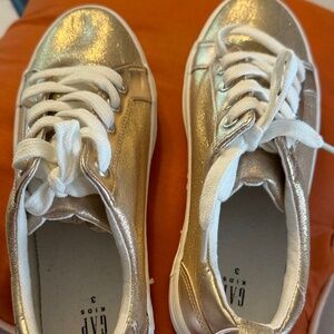 NWT girl's gold sneakers